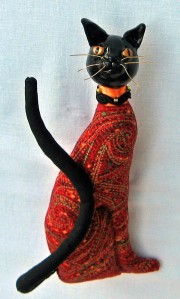 "Miu, Egyptian Cat in Red." An original CallyWally Soft-Sculpture. Wall-Art. Mixed Media. Approx. 12" tall. Cally Curtis, Artist. For Sale.